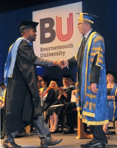 Barney Kavai graduating from Bournemouth University